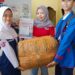 Cinta Menyapa Banjir Sumatera: UPT SMP N 1 Pinrang Salurkan Bantuan Lewat JNE dan WIZ