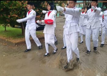 ‎Upacara Forkopimca Duampanua Tetap Khidmat Meski Lokasi Tergenang Air